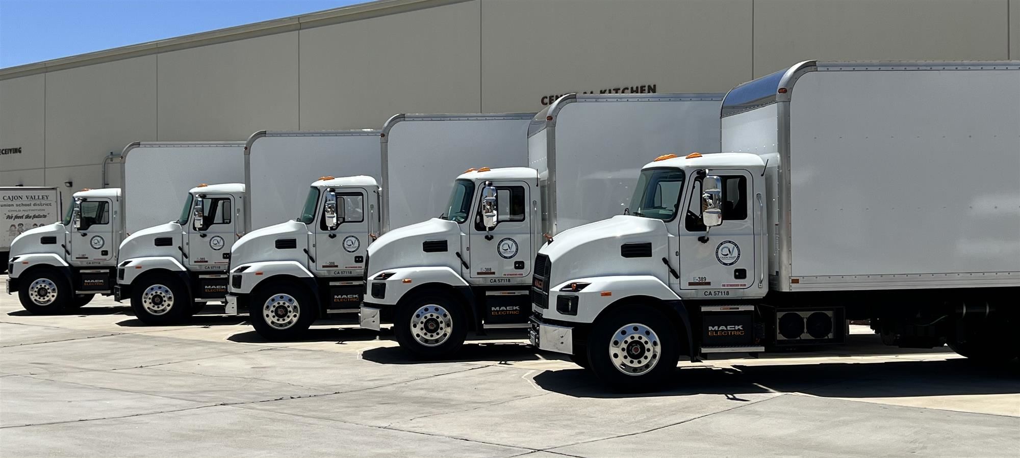 5 Cajon Valley MACK EV Trucks lined up